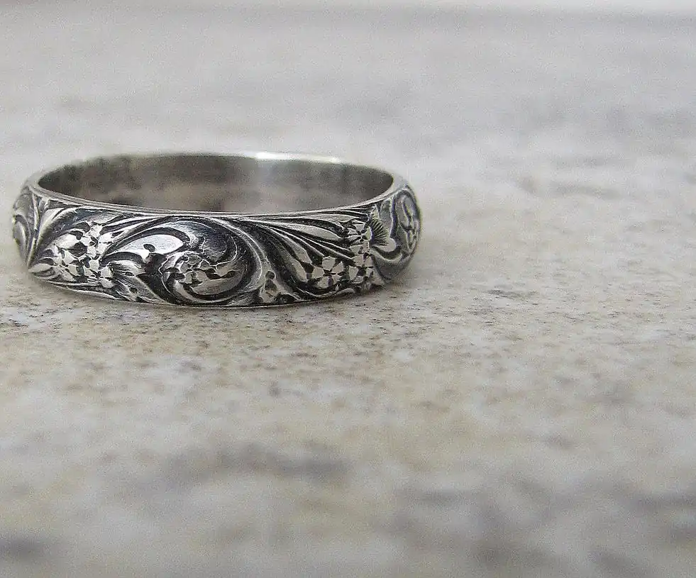 floral_antiqued_silver_ring_by_silversmack-d41dr0d.jpg